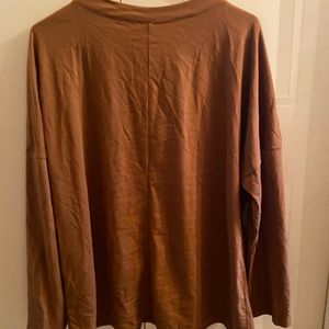 Women’s tunic with fashion buttons never worn with tags